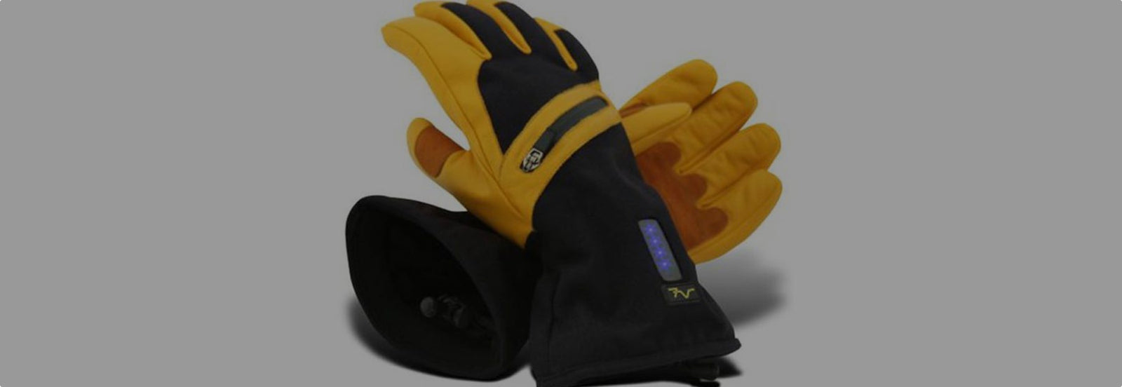 Pair of Volt Heat heated gloves displayed, highlighting warmth and comfort for cold weather